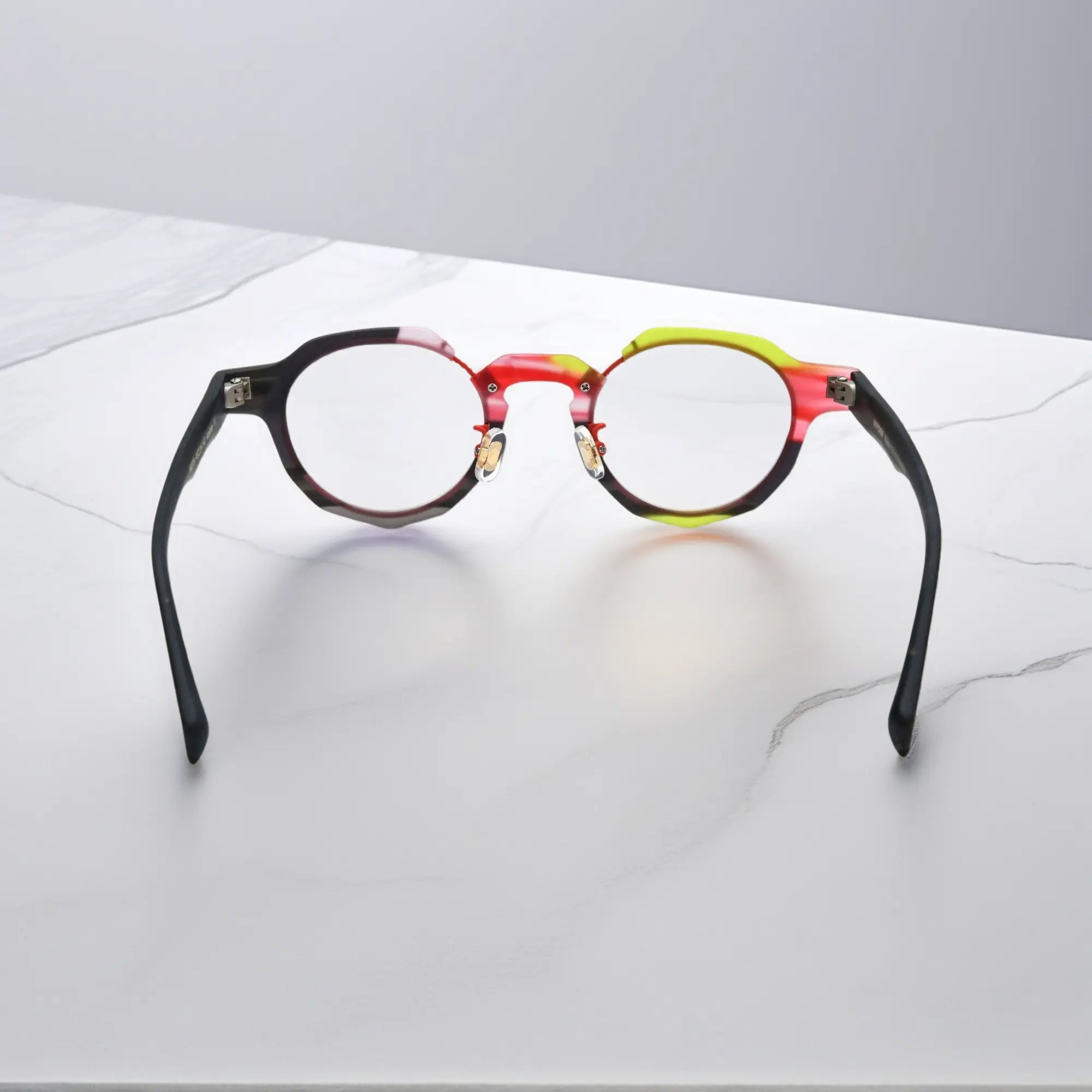 Rear angle of VoyueLens™ Midnight Flame eyeglasses with stylish red-black layering
